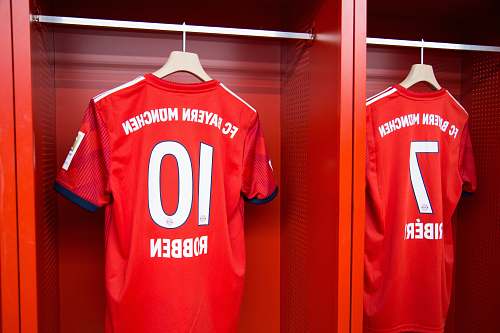 indoors red 10 Robben soccer jersey hanging room